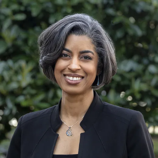 A professional headshot of Ryan Palmer. She has chin-length hair and wears a black blazer.