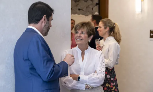 Clark Foundation Board Chair Courtney Clark Pastrick listens intently to a grantee leader during the annual Veterans summit.